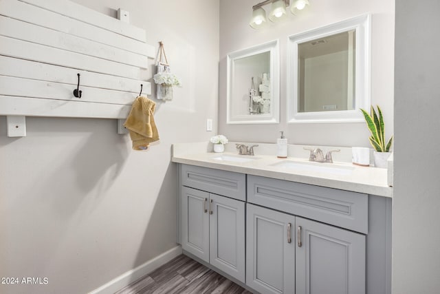 bathroom featuring vanity and hardwood / wood-style floors