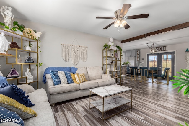 living room featuring ceiling fan, french doors, beam ceiling, and wood-type flooring