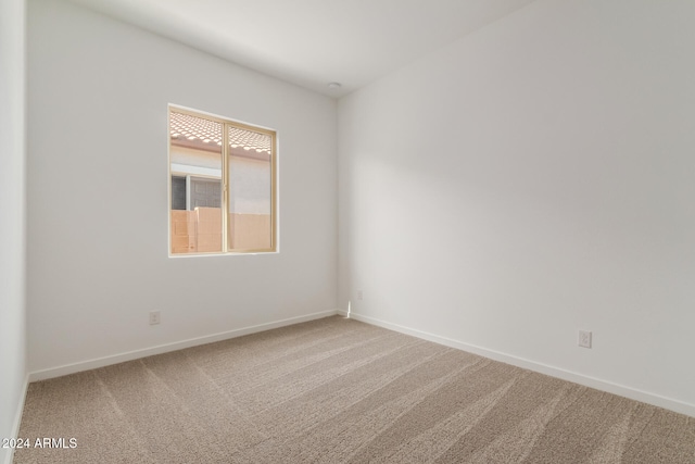 unfurnished room with carpet floors