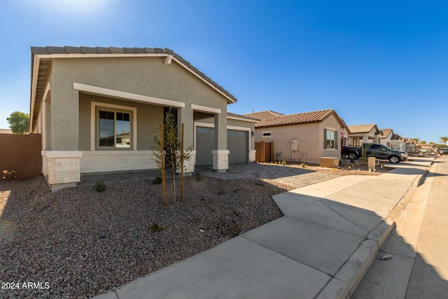 view of front of property with a garage