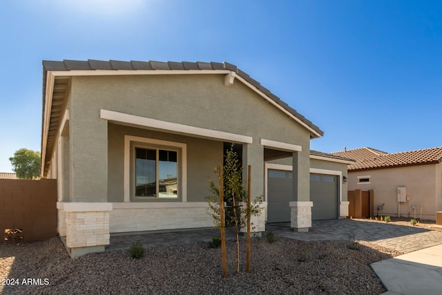 view of front of property with a garage