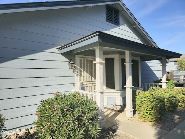 entrance to property with a porch