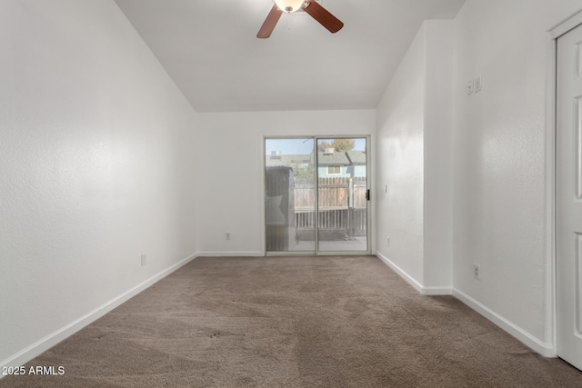 empty room with carpet floors, ceiling fan, and lofted ceiling