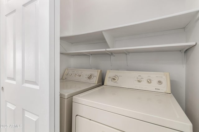 laundry area featuring independent washer and dryer