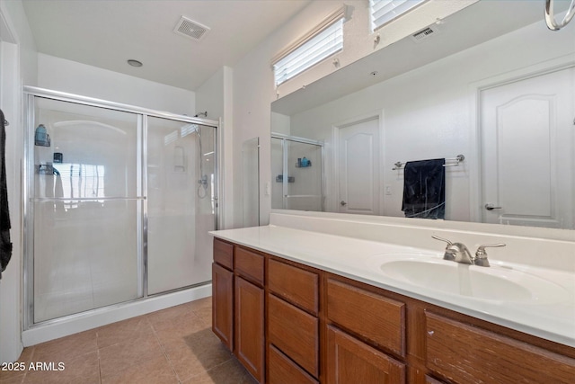 1350 S Greenfield Rd Unit 2133, Mesa, AZ 85206 - bathroom featuring vanity, a stall shower, and tile patterned flooring