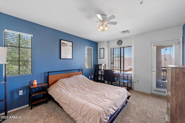 1350 S Greenfield Rd Unit 2133, Mesa, AZ 85206 - carpeted bedroom featuring baseboards, access to exterior, and ceiling fan