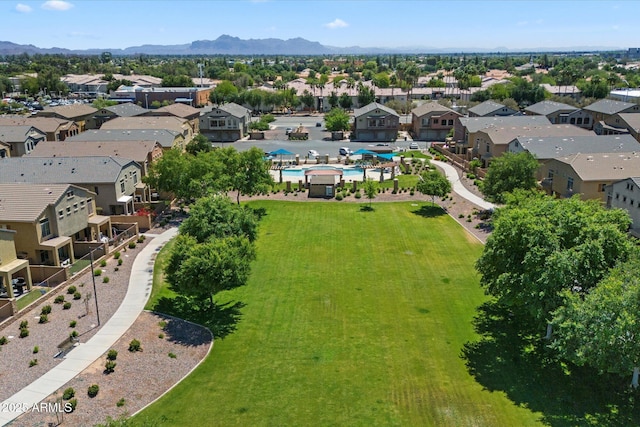 1350 S Greenfield Rd Unit 2133, Mesa, AZ 85206 - aerial view of residential area with a pool area and a mountain backdrop