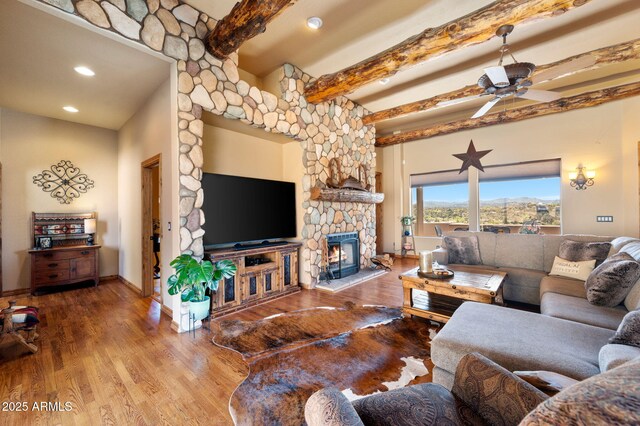 2259 Whitetail Ln, Prescott, AZ 86301 - living area featuring recessed lighting, wood finished floors, a ceiling fan, and a stone fireplace