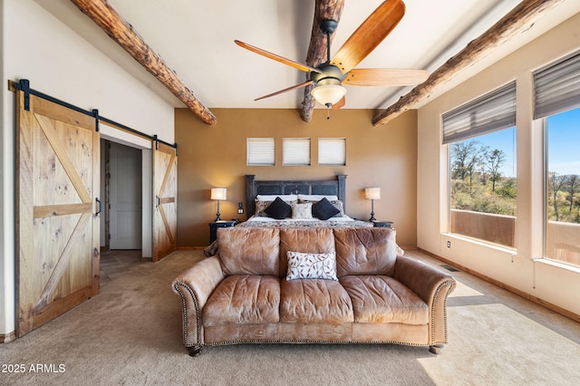 2259 Whitetail Ln, Prescott, AZ 86301 - carpeted bedroom with beam ceiling, a barn door, baseboards, visible vents, and ceiling fan