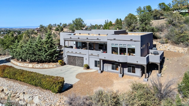 2259 Whitetail Ln, Prescott, AZ 86301 - view of front of property with an attached garage, concrete driveway, and stucco siding