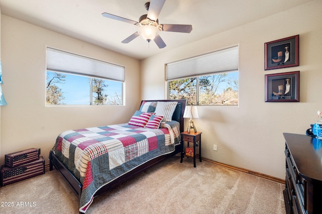 2259 Whitetail Ln, Prescott, AZ 86301 - carpeted bedroom featuring ceiling fan, baseboards, and multiple windows