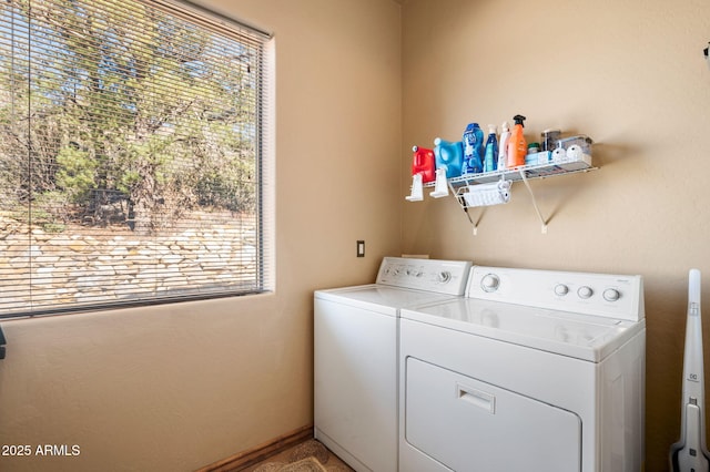 2259 Whitetail Ln, Prescott, AZ 86301 - washroom with a healthy amount of sunlight, washing machine and clothes dryer, baseboards, and laundry area
