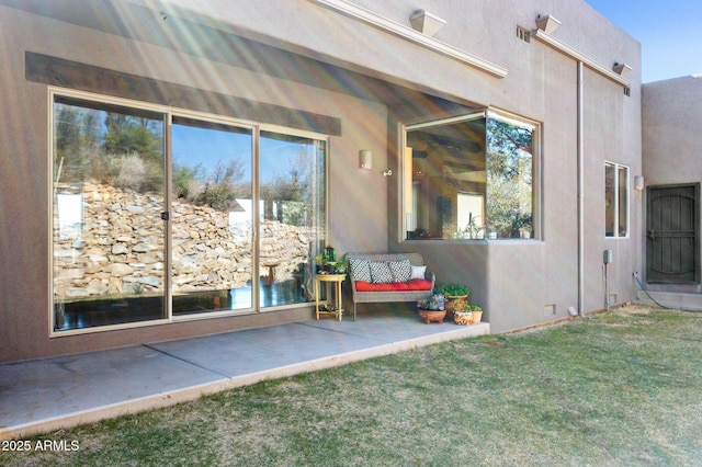 2259 Whitetail Ln, Prescott, AZ 86301 - exterior space with stucco siding, a patio, and a lawn