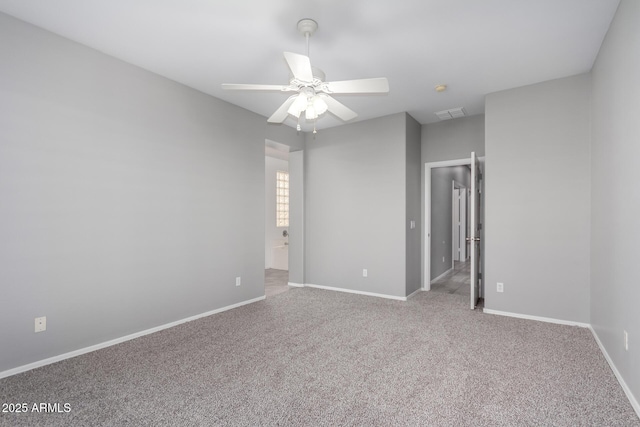 carpeted empty room with ceiling fan