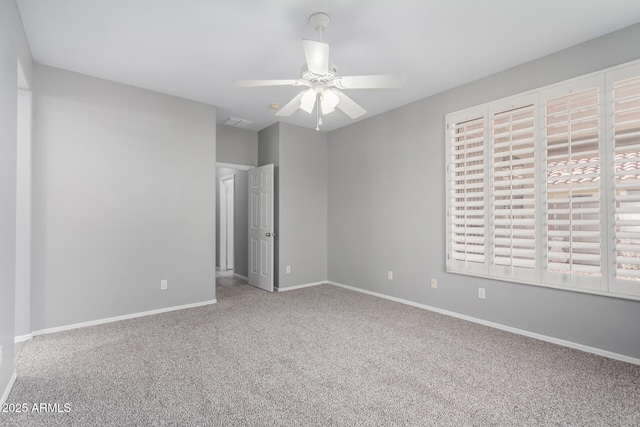 unfurnished bedroom with ceiling fan and carpet floors