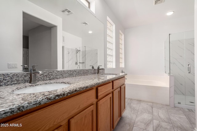 bathroom featuring vanity and plus walk in shower