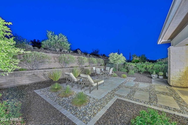 view of patio featuring outdoor dining area and a fenced backyard