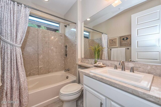 full bathroom with recessed lighting, vanity, toilet, and shower / bath combo with shower curtain