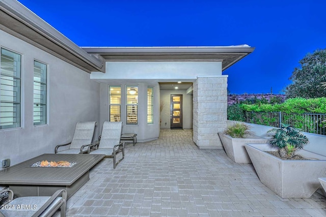 view of patio featuring fence
