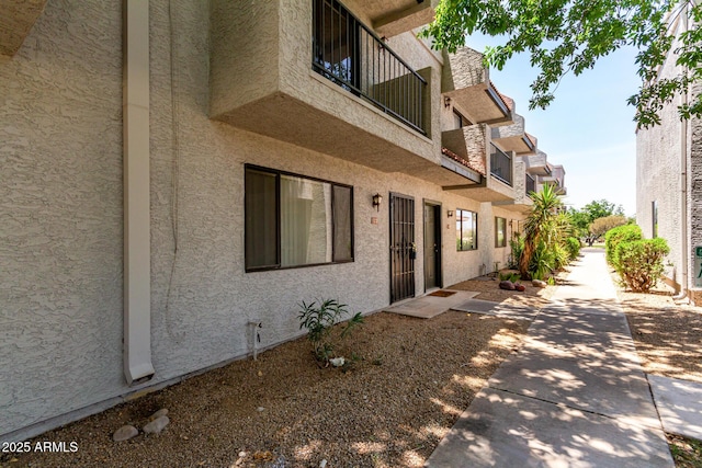 18239 N 40th St Unit 122, Phoenix, AZ 85032 - view of side of property featuring stucco siding and a patio