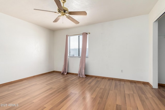18239 N 40th St Unit 122, Phoenix, AZ 85032 - unfurnished bedroom featuring light wood-style floors and a ceiling fan