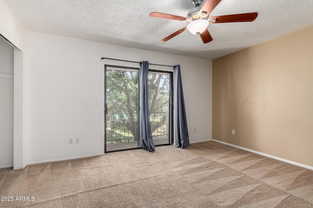 18239 N 40th St Unit 122, Phoenix, AZ 85032 - unfurnished bedroom with carpet floors, a textured ceiling, and ceiling fan