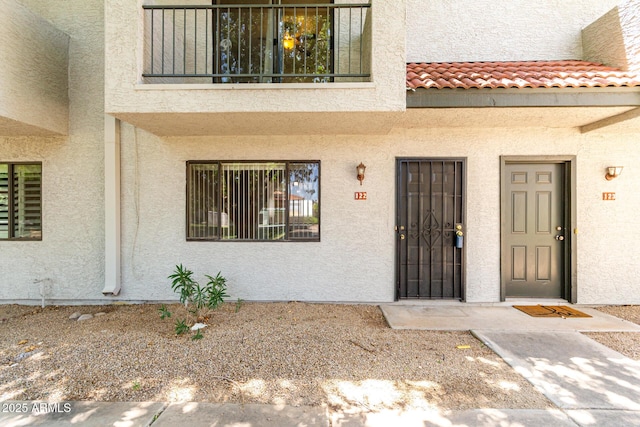 18239 N 40th St Unit 122, Phoenix, AZ 85032 - property entrance featuring a tile roof and stucco siding