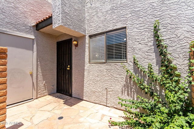 18239 N 40th St Unit 122, Phoenix, AZ 85032 - property entrance with stucco siding