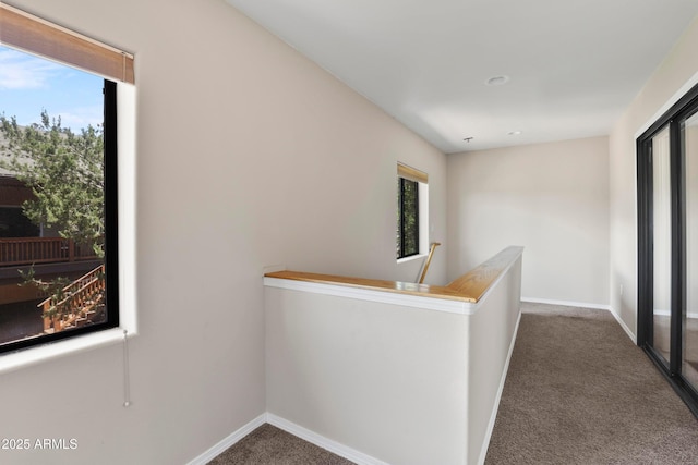 106 N Lariat Way, Payson, AZ 85541 - hallway with dark colored carpet, baseboards, and an upstairs landing