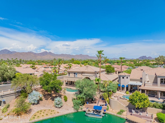 bird's eye view featuring a water and mountain view