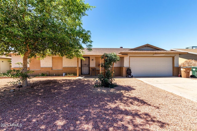 617 E Calle Adobe Ln, Goodyear, AZ 85338 - ranch-style home featuring stucco siding, an attached garage, concrete driveway, and brick siding