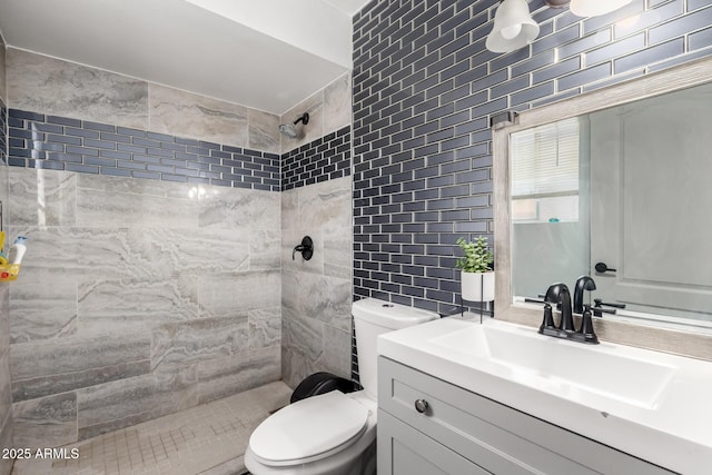 617 E Calle Adobe Ln, Goodyear, AZ 85338 - full bath featuring tile walls, tiled shower, and vanity
