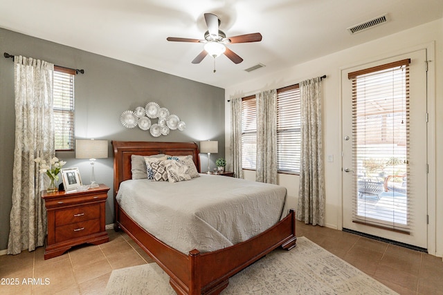 bedroom featuring access to exterior, visible vents, ceiling fan, and light tile patterned floors