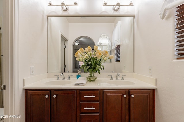 bathroom with double vanity and a sink