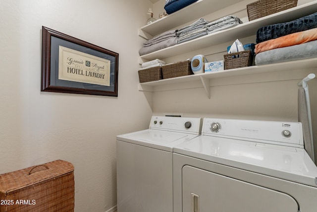 laundry room featuring laundry area and washing machine and clothes dryer