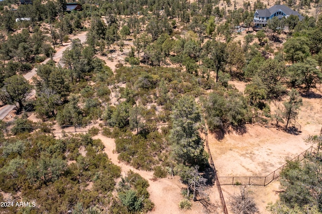 birds eye view of property featuring a rural view