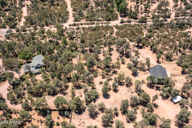 birds eye view of property featuring a rural view