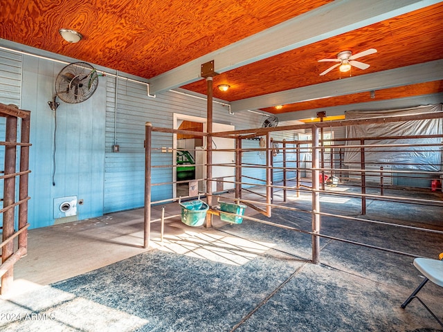 interior space featuring wood walls