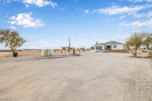 view of yard featuring a garage