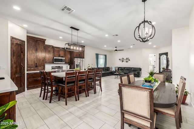 dining room with recessed lighting, visible vents, and ceiling fan