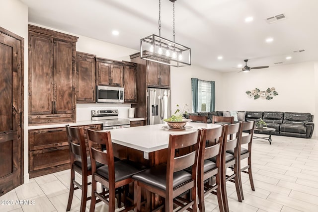 dining space featuring visible vents, recessed lighting, and ceiling fan