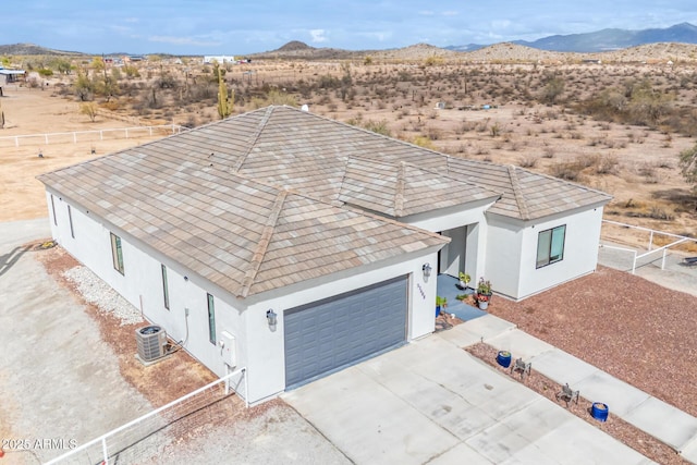 drone / aerial view with a mountain view and view of desert