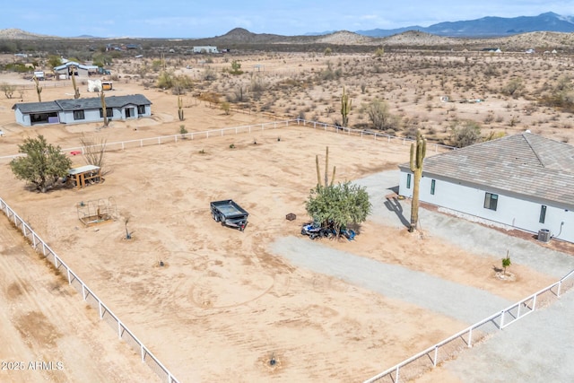 bird's eye view featuring a mountain view, a rural view, and view of desert