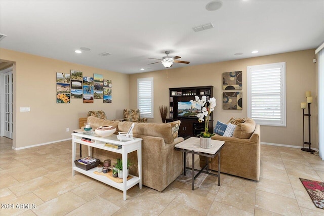 living room featuring ceiling fan