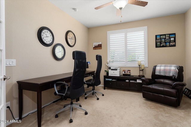 office space featuring light colored carpet and ceiling fan