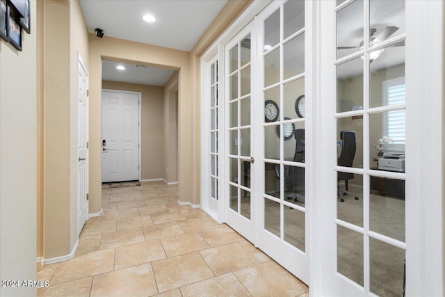 corridor featuring french doors