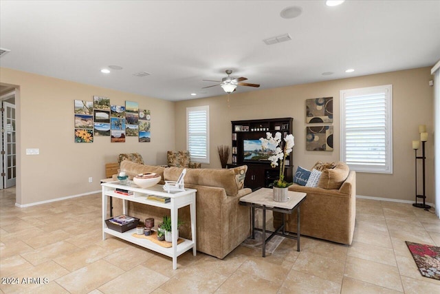 living room with ceiling fan