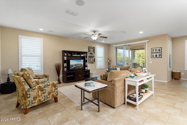 living room featuring ceiling fan