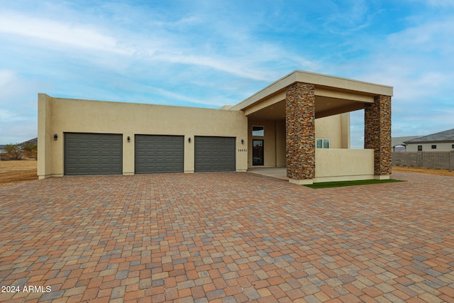 view of front of home featuring a garage