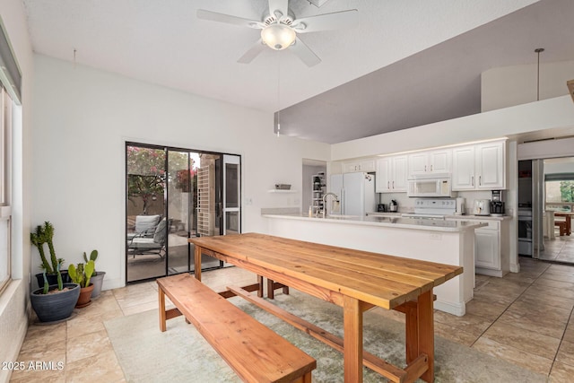 dining room with ceiling fan